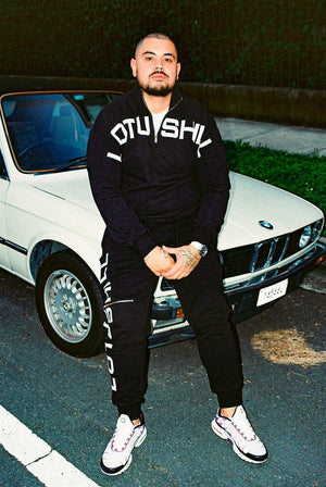 BLACK QUARTER ZIP